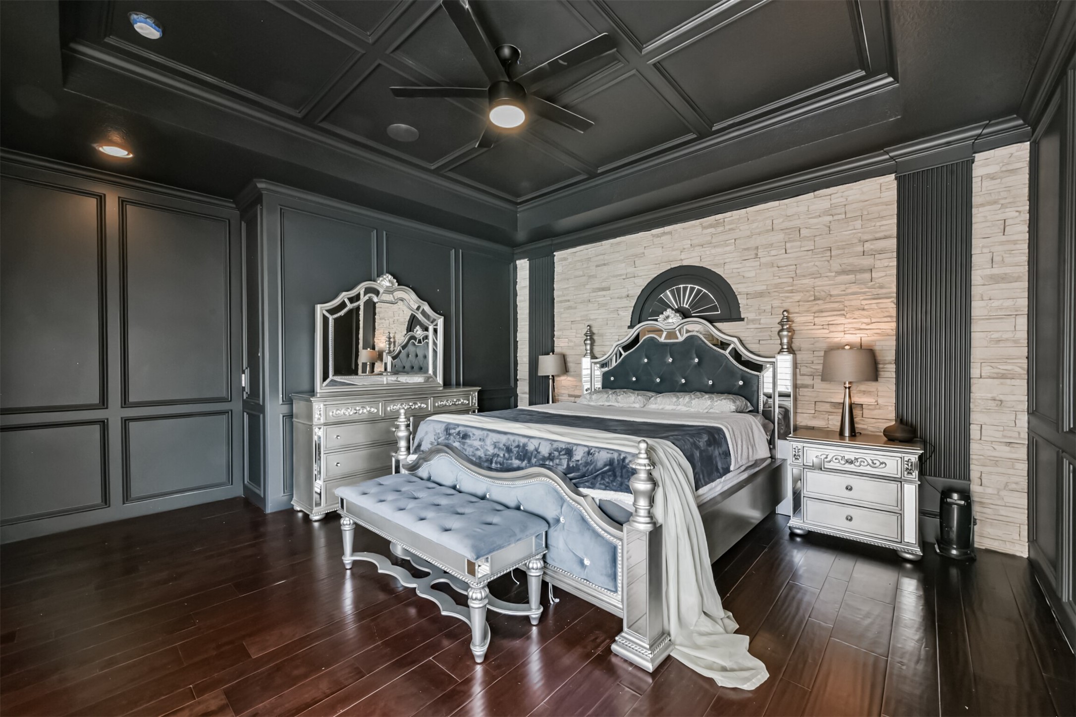 263 Wood Loop Street Houston, TX 77015 - Photo 26 of 48 a bedroom with a bed next to a large window with wooden floor