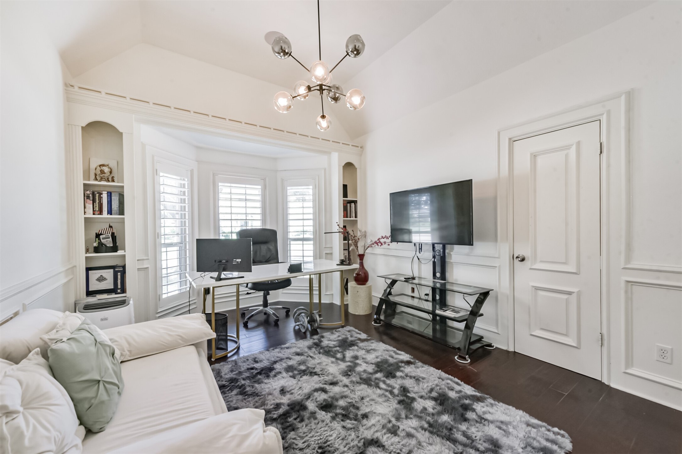 263 Wood Loop Street Houston, TX 77015 - Photo 39 of 48 a living room with furniture and a flat screen tv