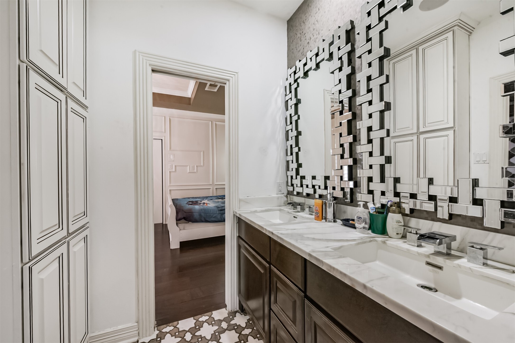263 Wood Loop Street Houston, TX 77015 - Photo 41 of 48 a bathroom with a double vanity sink and a mirror