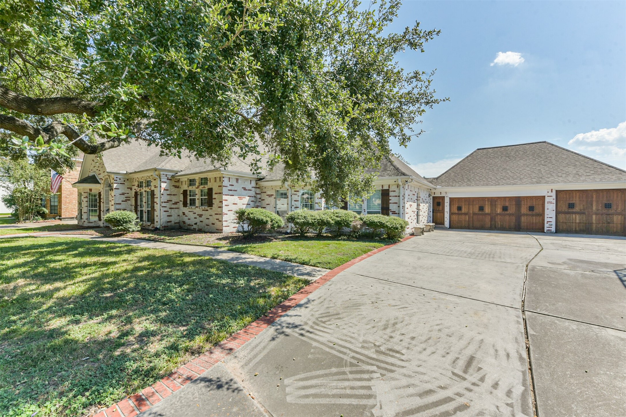 263 Wood Loop Street Houston, TX 77015 - Photo 9 of 48 a front view of a house with a garden