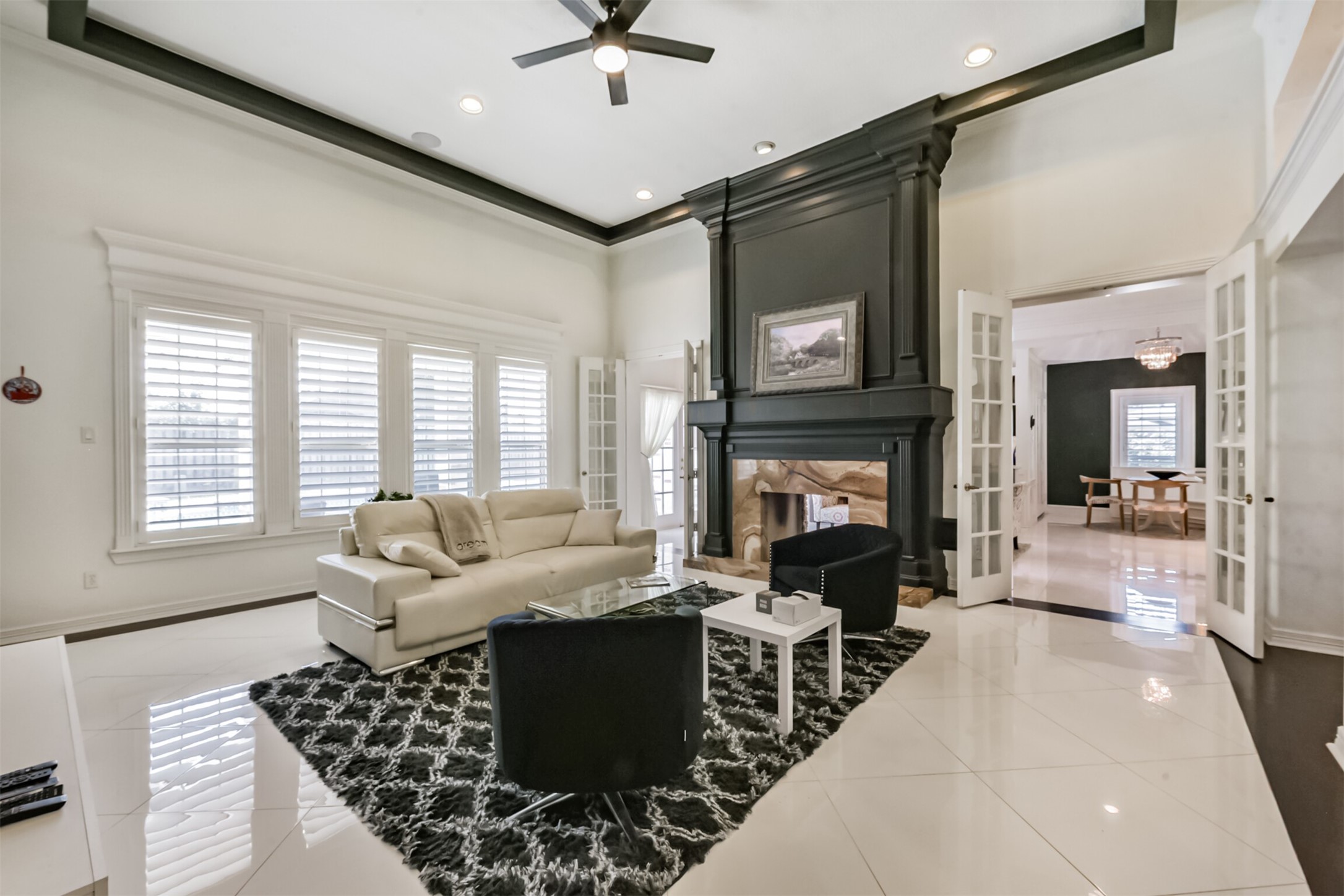 263 Wood Loop Street Houston, TX 77015 - Photo 10 of 48 a living room with furniture a window and a fireplace