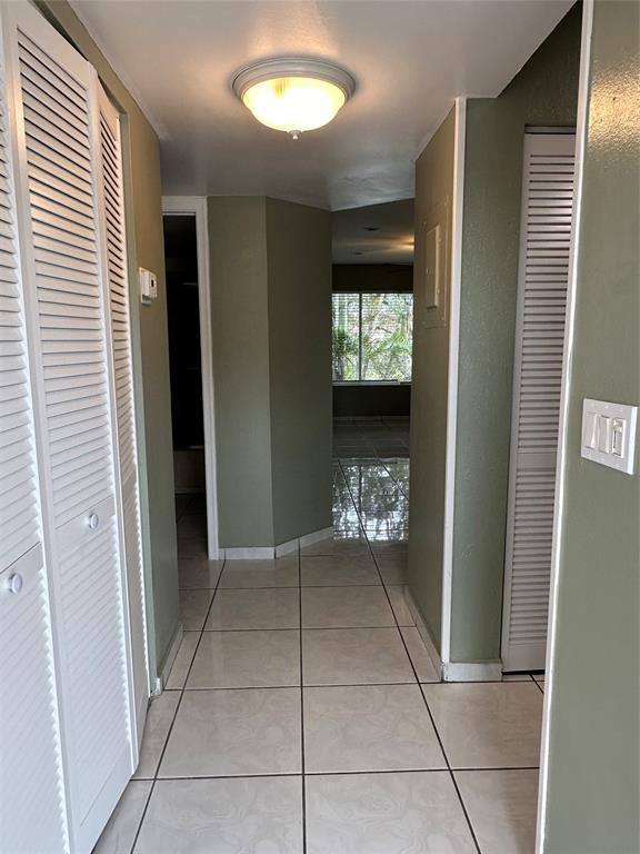 9971 Twin Lakes Drive, Unit 9G Coral Springs, FL 33071 - Photo 2 of 13 a view of entryway with a front door