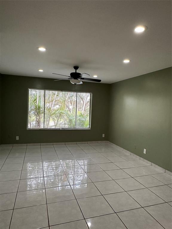 9971 Twin Lakes Drive, Unit 9G Coral Springs, FL 33071 - Photo 8 of 13 a view of an empty room with a window