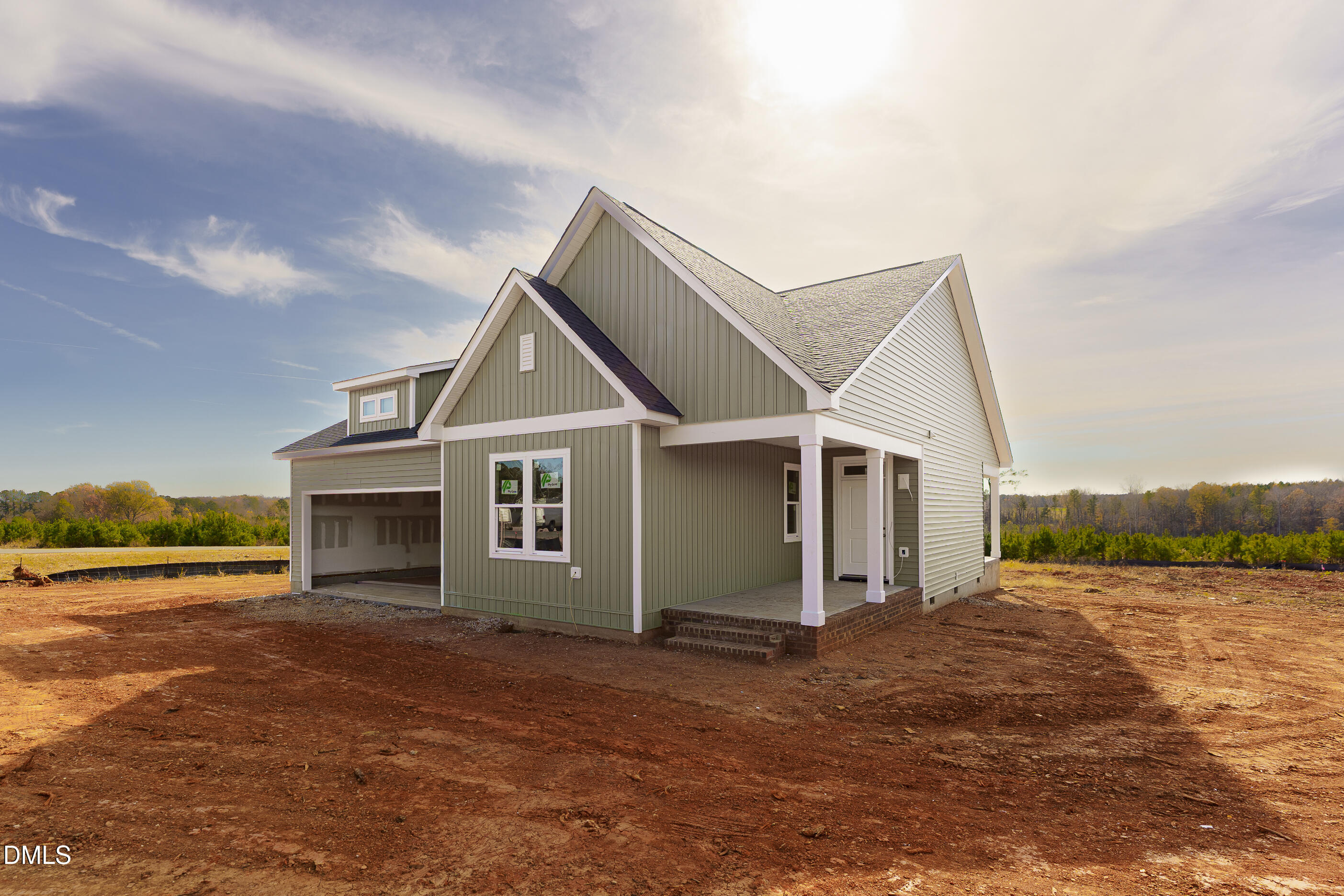2784 River Meadow Spring Hope, NC 27882 - Photo 2 of 19 a view of a house with backyard and a yard