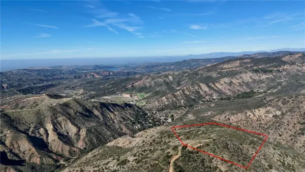 a view of a city with green space