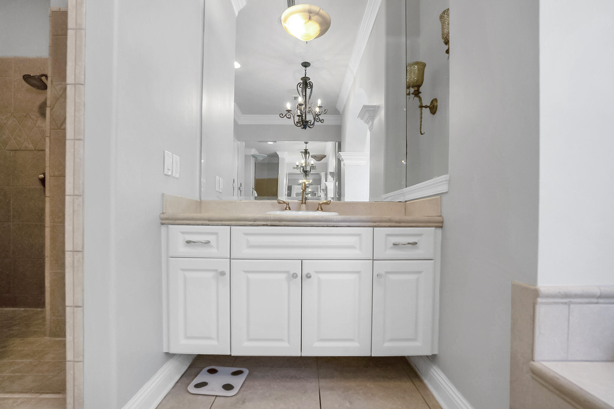 4372 Stonebridge Road Destin, FL 32541 - Photo 30 of 83 a bathroom with a sink and a mirror