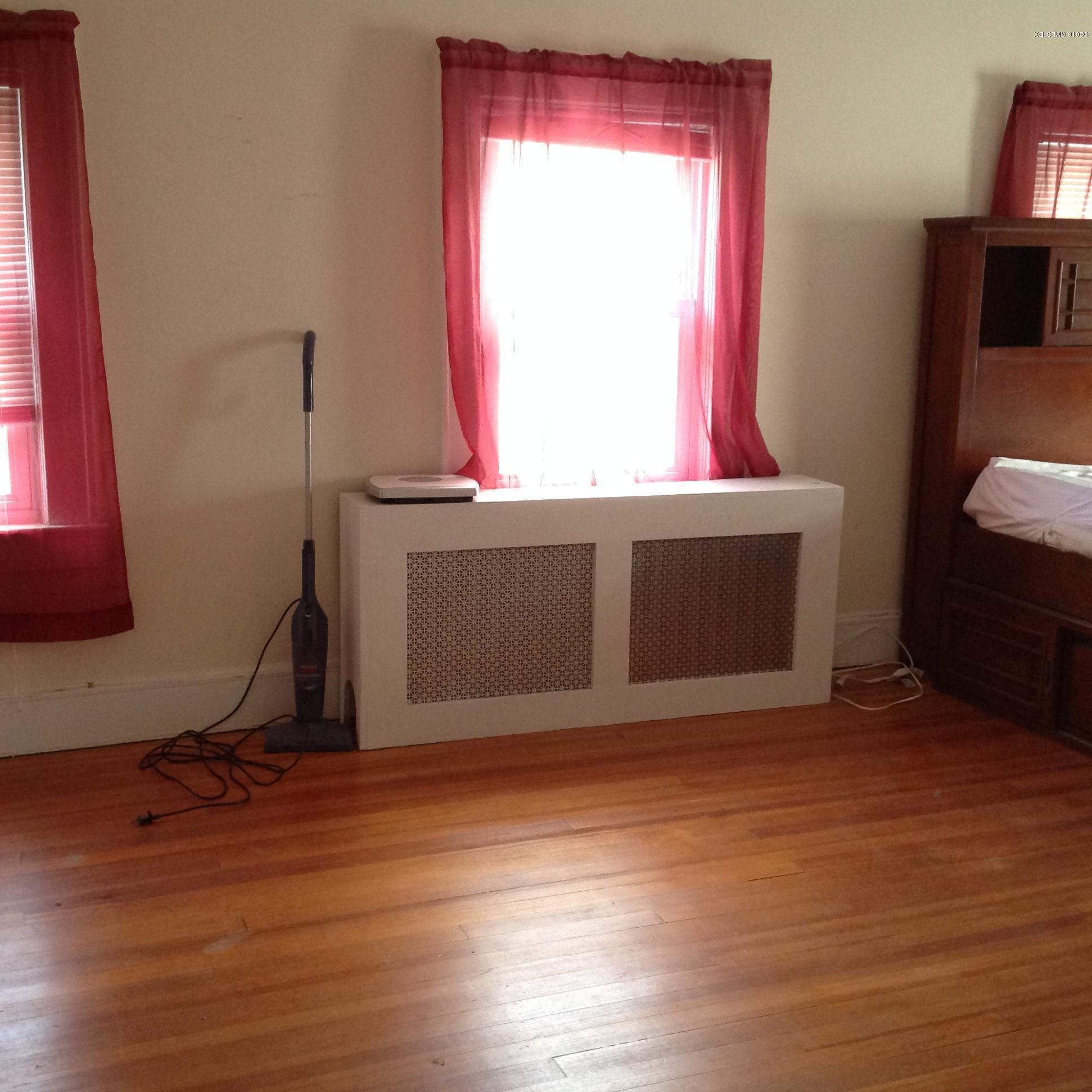 40 Sheep Hill Road Riverside, CT 06878 - Photo 7 of 11 a view of an empty room with wooden floor and a window