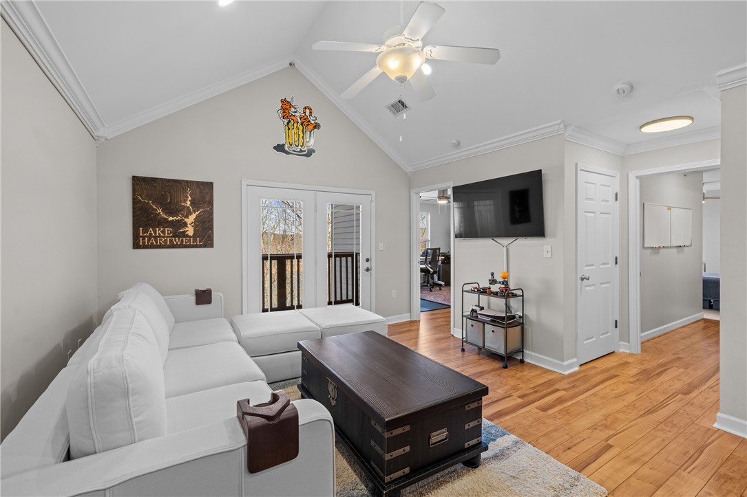 433 Harts Cove Way Seneca, SC 29678 - Photo 1 of 24 Beautiful top floor view of lake Hartwell all year- Vaulted smooth ceilings with molding