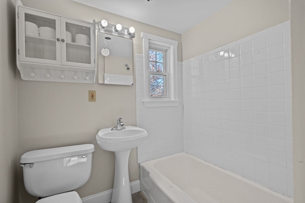 13 Giles Avenue, Unit 2 Beverly, MA 01915 - Photo 16 of 27 a bathroom with a sink toilet and shower