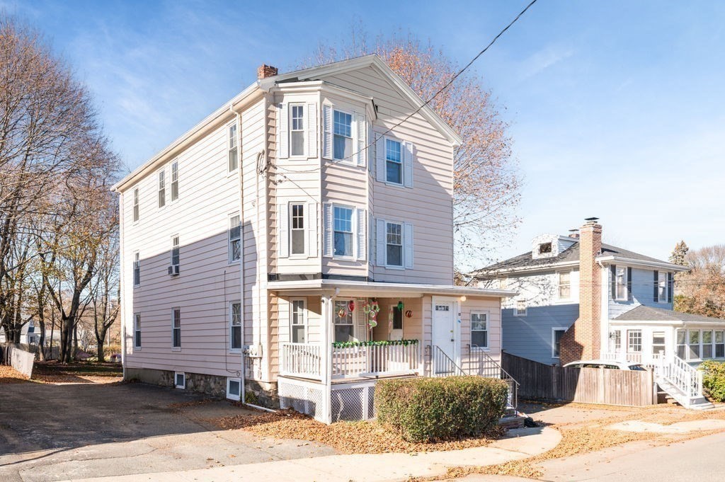 13 Giles Avenue, Unit 2 Beverly, MA 01915 - Photo 18 of 27 a front view of a building with a street
