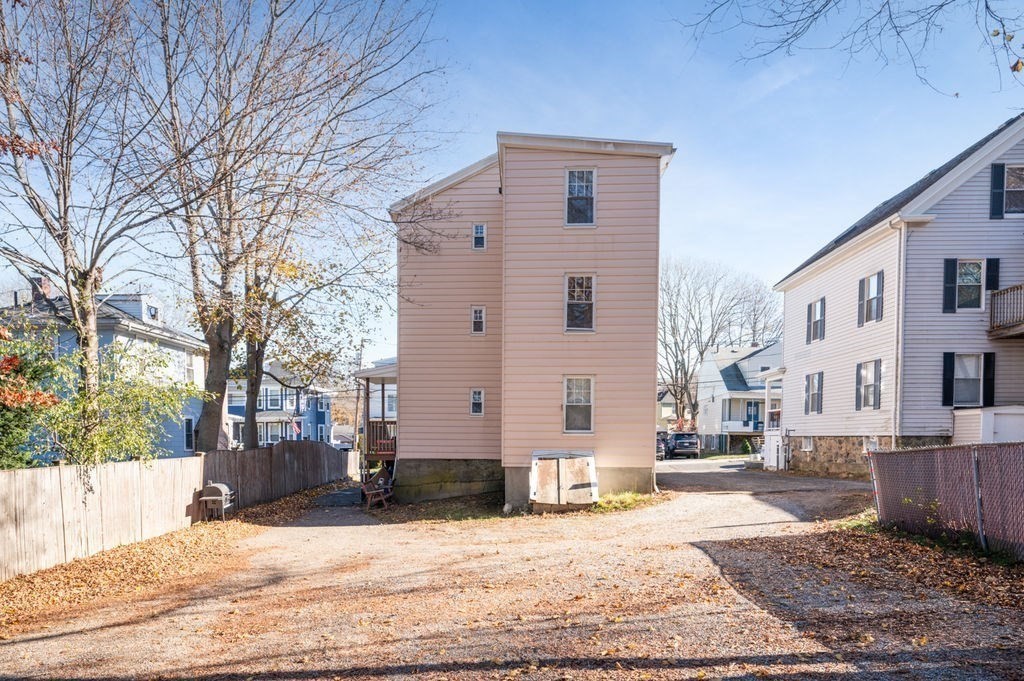 13 Giles Avenue, Unit 2 Beverly, MA 01915 - Photo 19 of 27 a view of a house with a yard