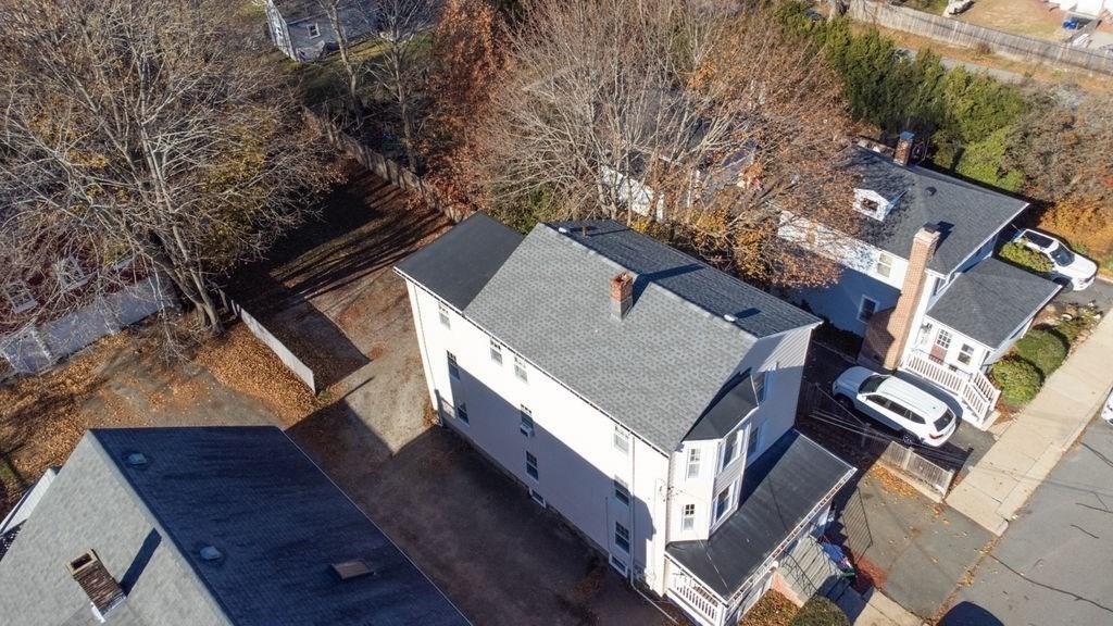 13 Giles Avenue, Unit 2 Beverly, MA 01915 - Photo 20 of 27 an aerial view of a house with a yard