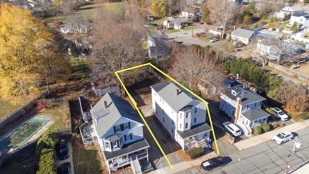 13 Giles Avenue, Unit 2 Beverly, MA 01915 - Photo 22 of 27 a view of an buildings with a tree