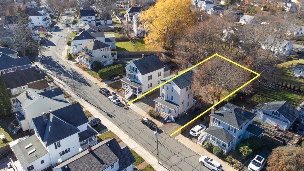 13 Giles Avenue, Unit 2 Beverly, MA 01915 - Photo 23 of 27 an aerial view of a house with a garden