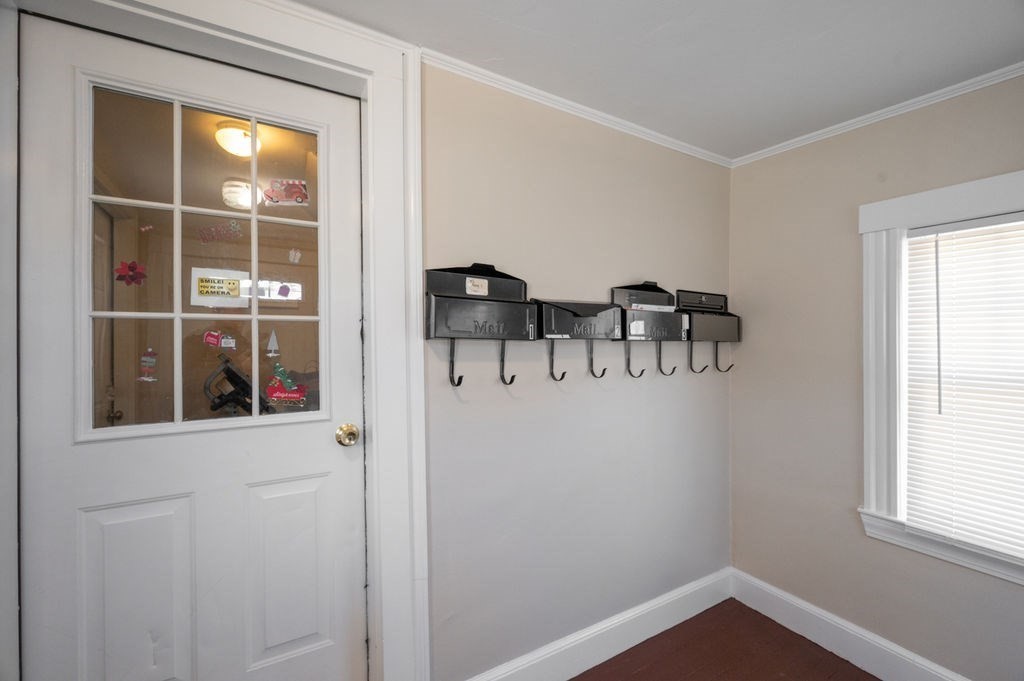 13 Giles Avenue, Unit 2 Beverly, MA 01915 - Photo 3 of 27 a view of room with window and furniture