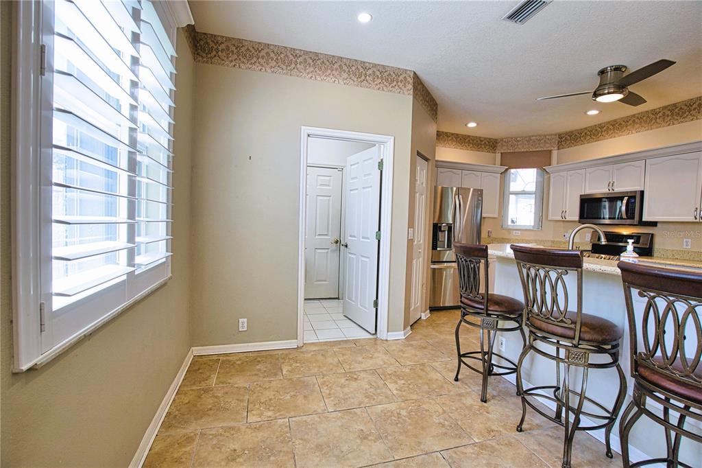 4398 Summertree Road Venice, FL 34293 - Photo 9 of 38 a view of a livingroom with furniture and a window