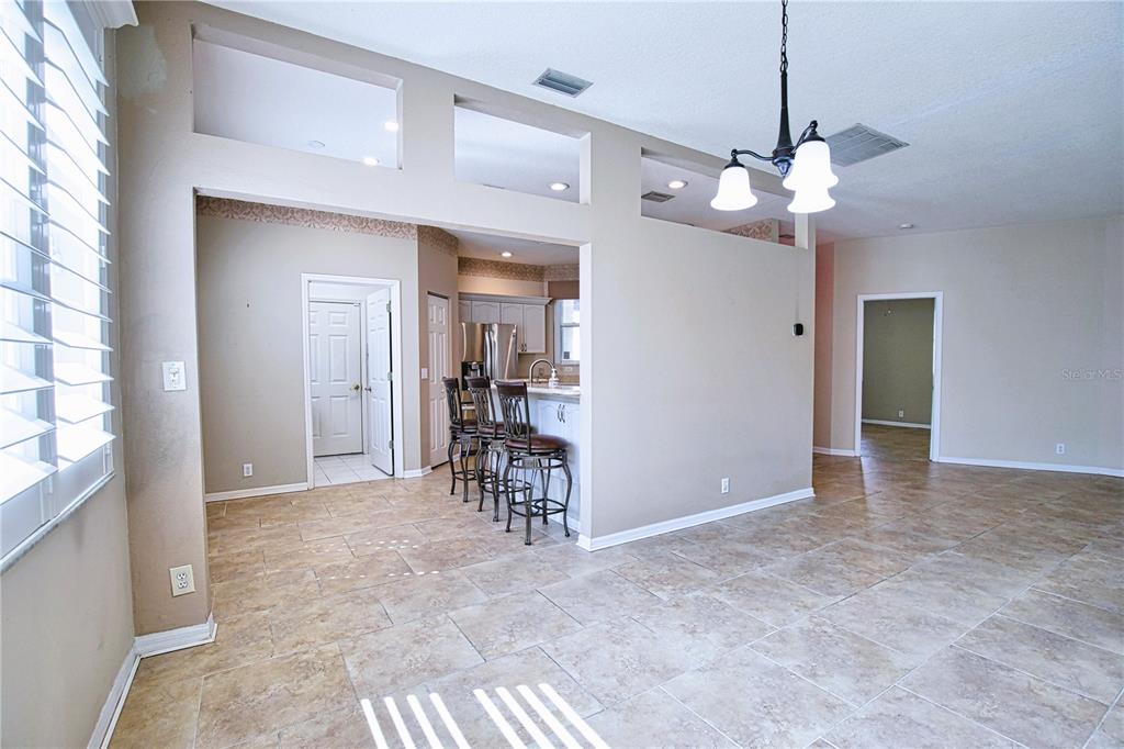 4398 Summertree Road Venice, FL 34293 - Photo 10 of 38 a view of a livingroom with a flat screen tv and furniture