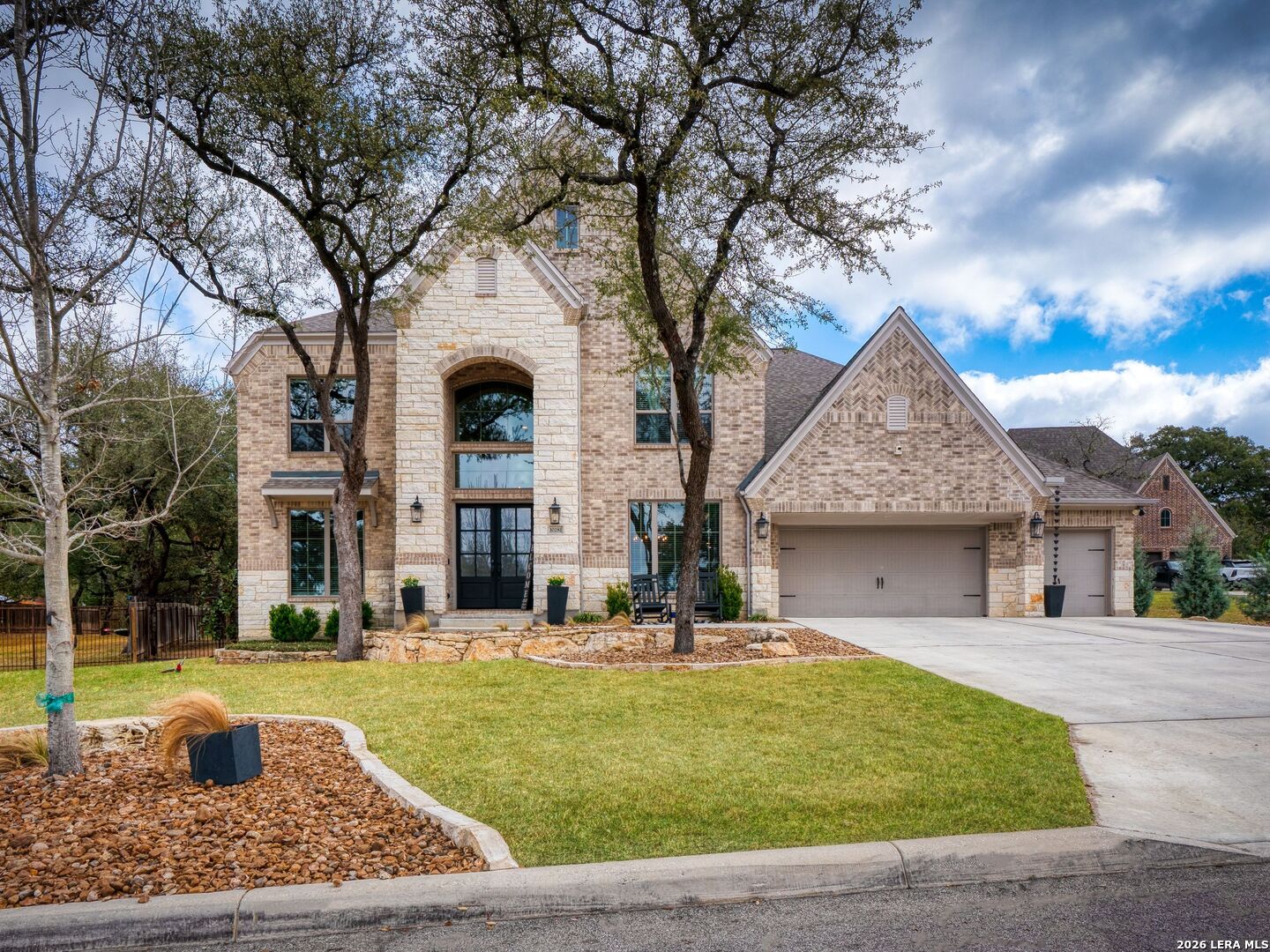 10281 Headwind Boerne, TX 78006 - Photo 1 of 45 a front view of a house with garden