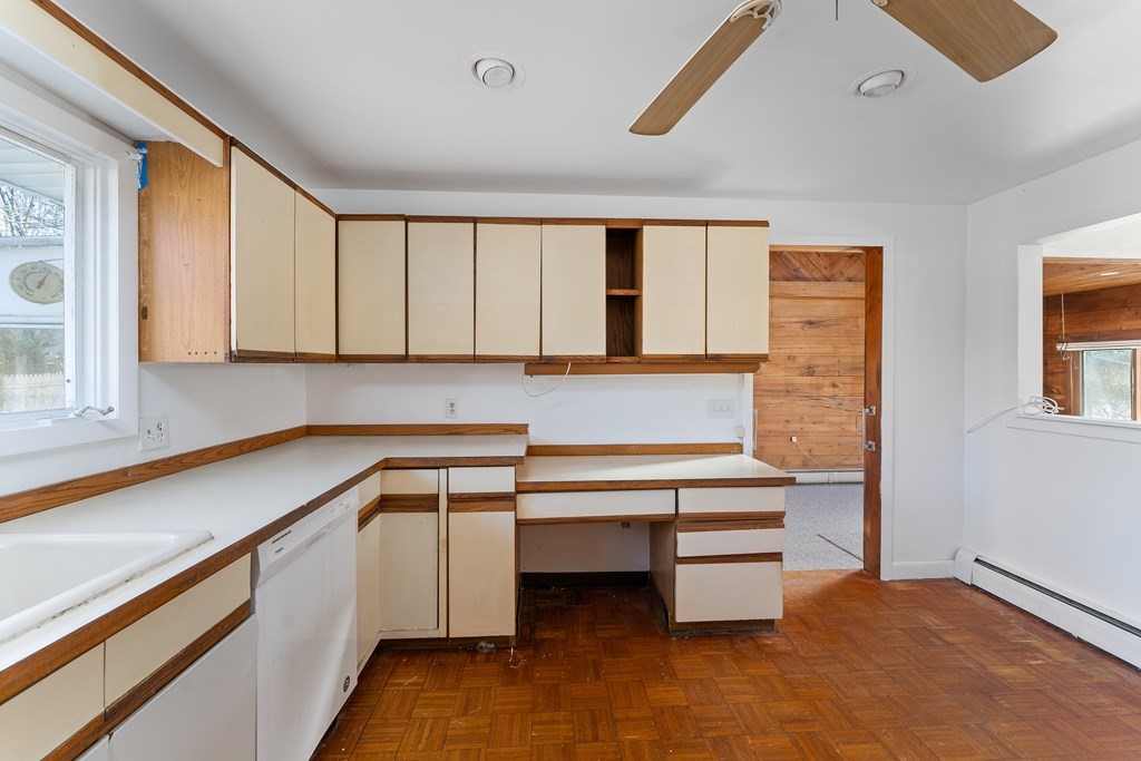 110 Fieldwood Avenue Seekonk, MA 02771 - Photo 11 of 33 a kitchen with a sink and cabinets