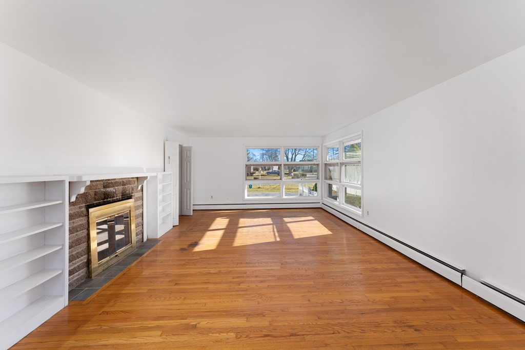 110 Fieldwood Avenue Seekonk, MA 02771 - Photo 15 of 33 a room with furniture and a wooden floor