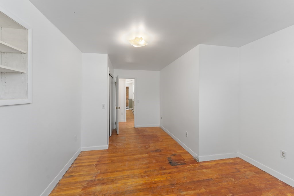 110 Fieldwood Avenue Seekonk, MA 02771 - Photo 19 of 33 a view of a hallway with wooden floor