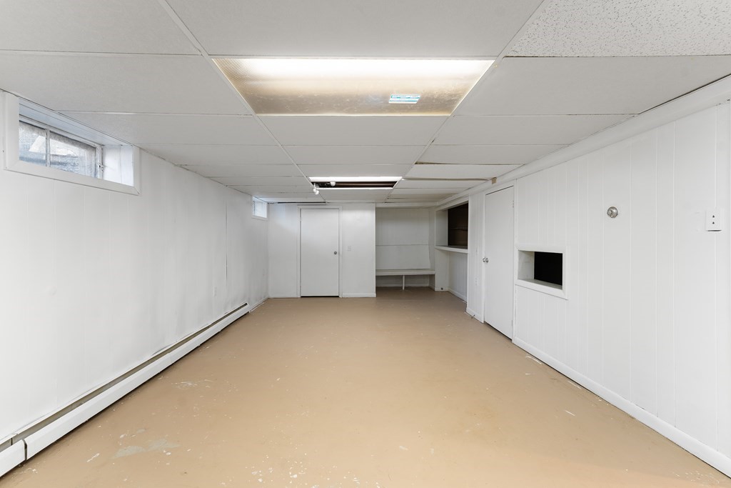 110 Fieldwood Avenue Seekonk, MA 02771 - Photo 26 of 33 an empty room with a empty space and windows