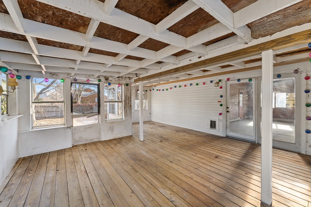110 Fieldwood Avenue Seekonk, MA 02771 - Photo 30 of 33 a view of an empty room with wooden floor and a window