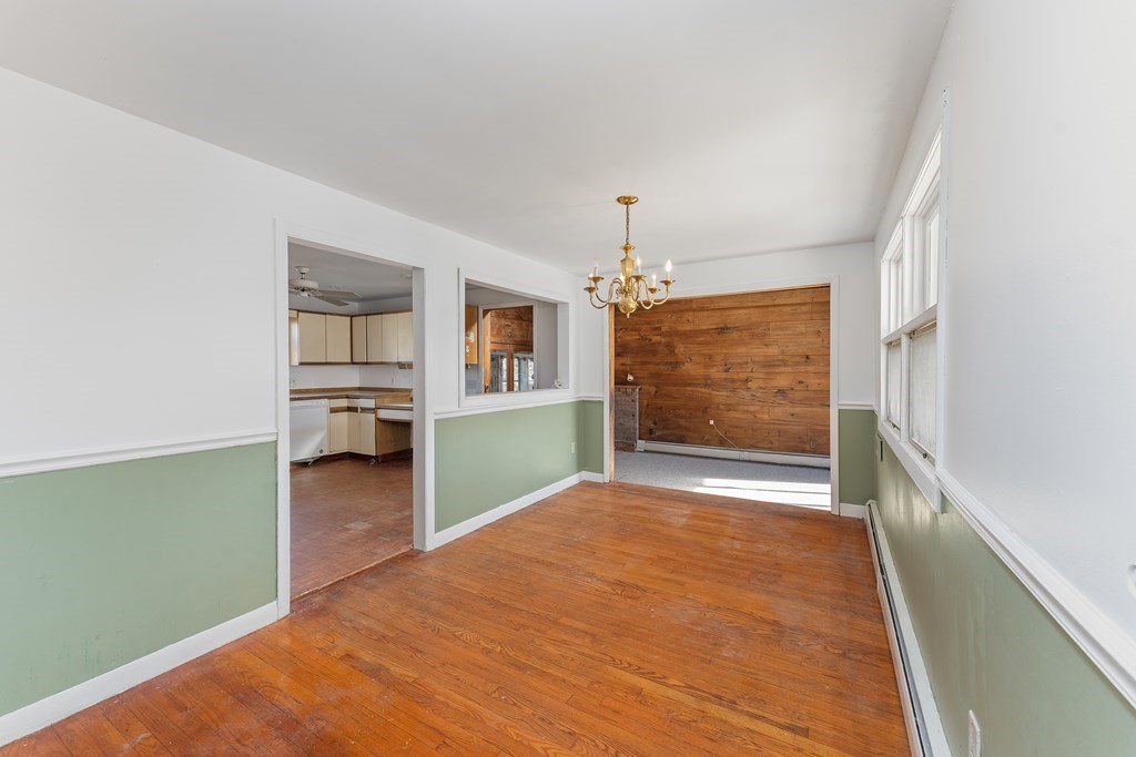 110 Fieldwood Avenue Seekonk, MA 02771 - Photo 3 of 33 wooden floor in an empty room with a window