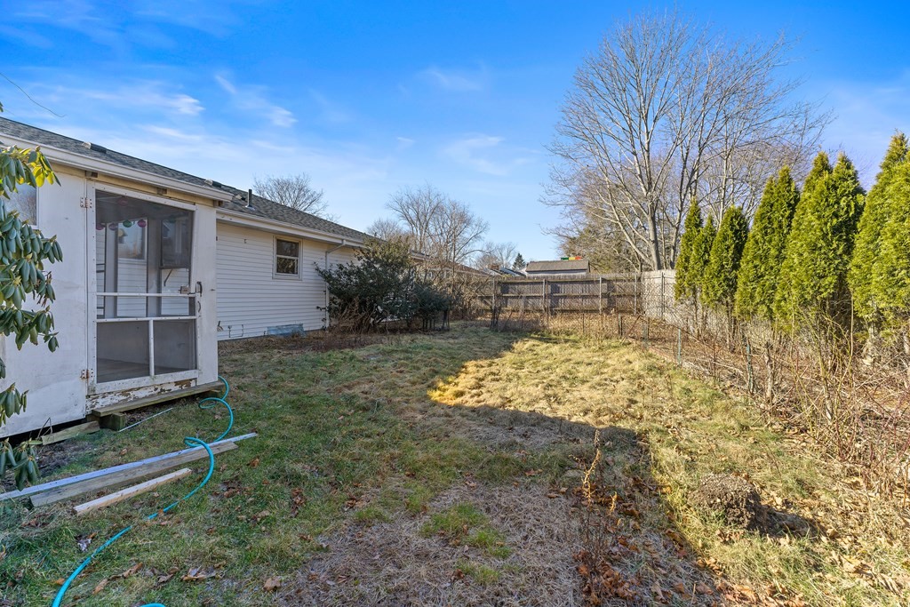 110 Fieldwood Avenue Seekonk, MA 02771 - Photo 33 of 33 a front view of a house with garden