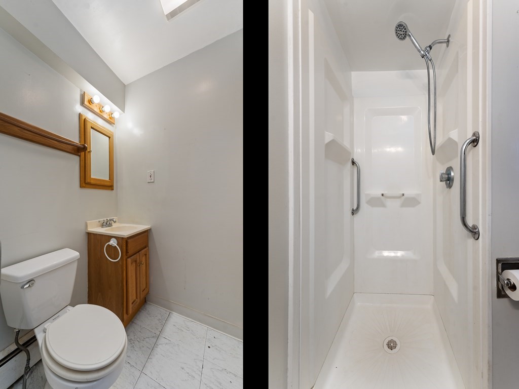 110 Fieldwood Avenue Seekonk, MA 02771 - Photo 7 of 33 a white toilet sitting next to a bathroom sink