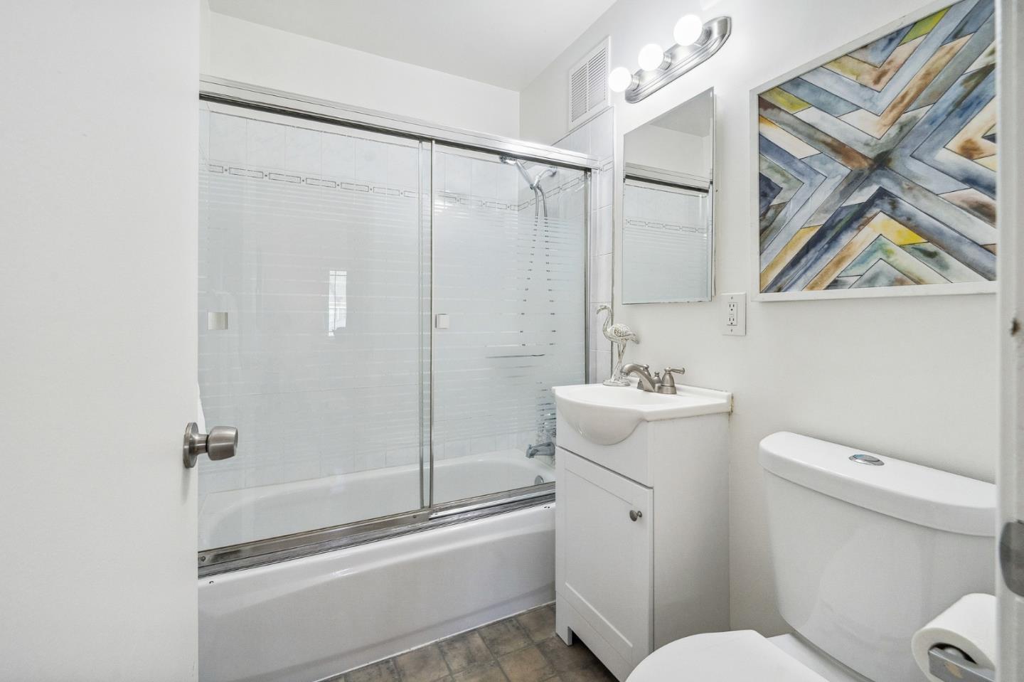 548 Inverness Drive Pacifica, CA 94044 - Photo 12 of 24 a bathroom with a sink a toilet and shower