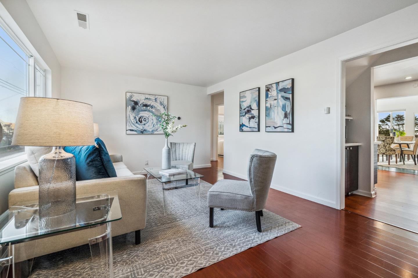 548 Inverness Drive Pacifica, CA 94044 - Photo 3 of 24 a living room with furniture and wooden floor