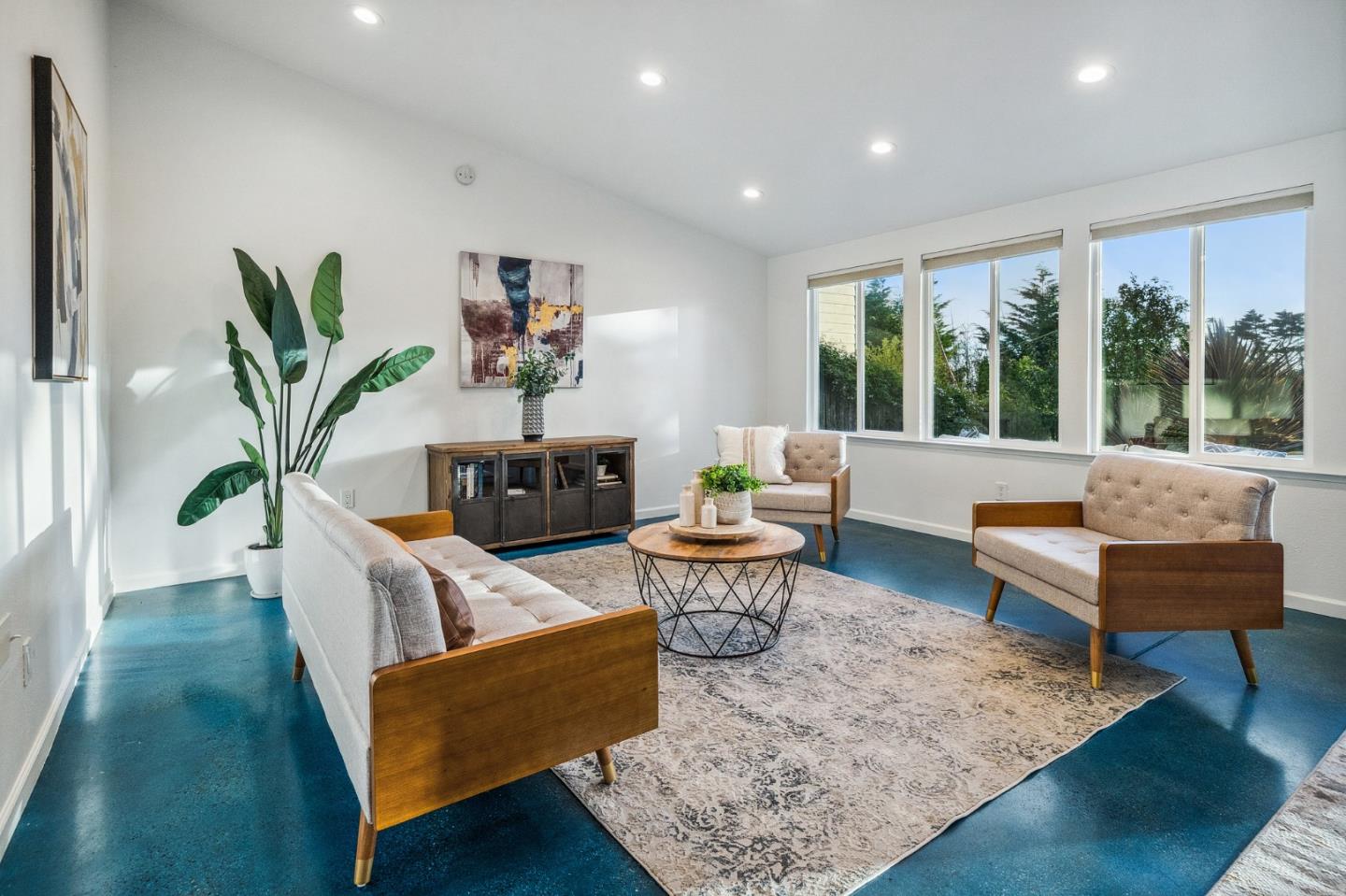 548 Inverness Drive Pacifica, CA 94044 - Photo 8 of 24 a living room with furniture and a potted plant