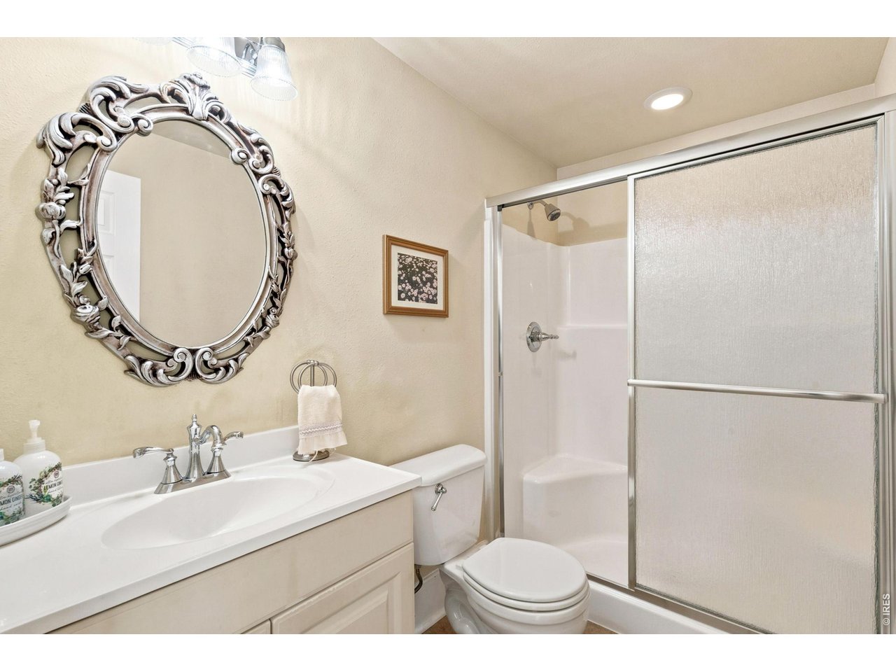 301 North Whitcomb Street Fort Collins, CO 80521 - Photo 21 of 50 Attached 3/4 bath with walk-in shower.