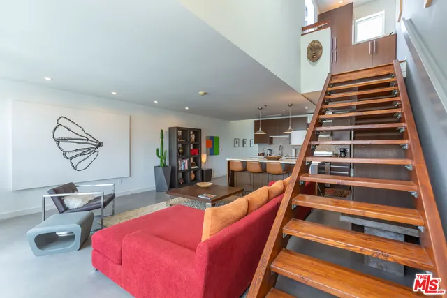 a view of a living room and dining room