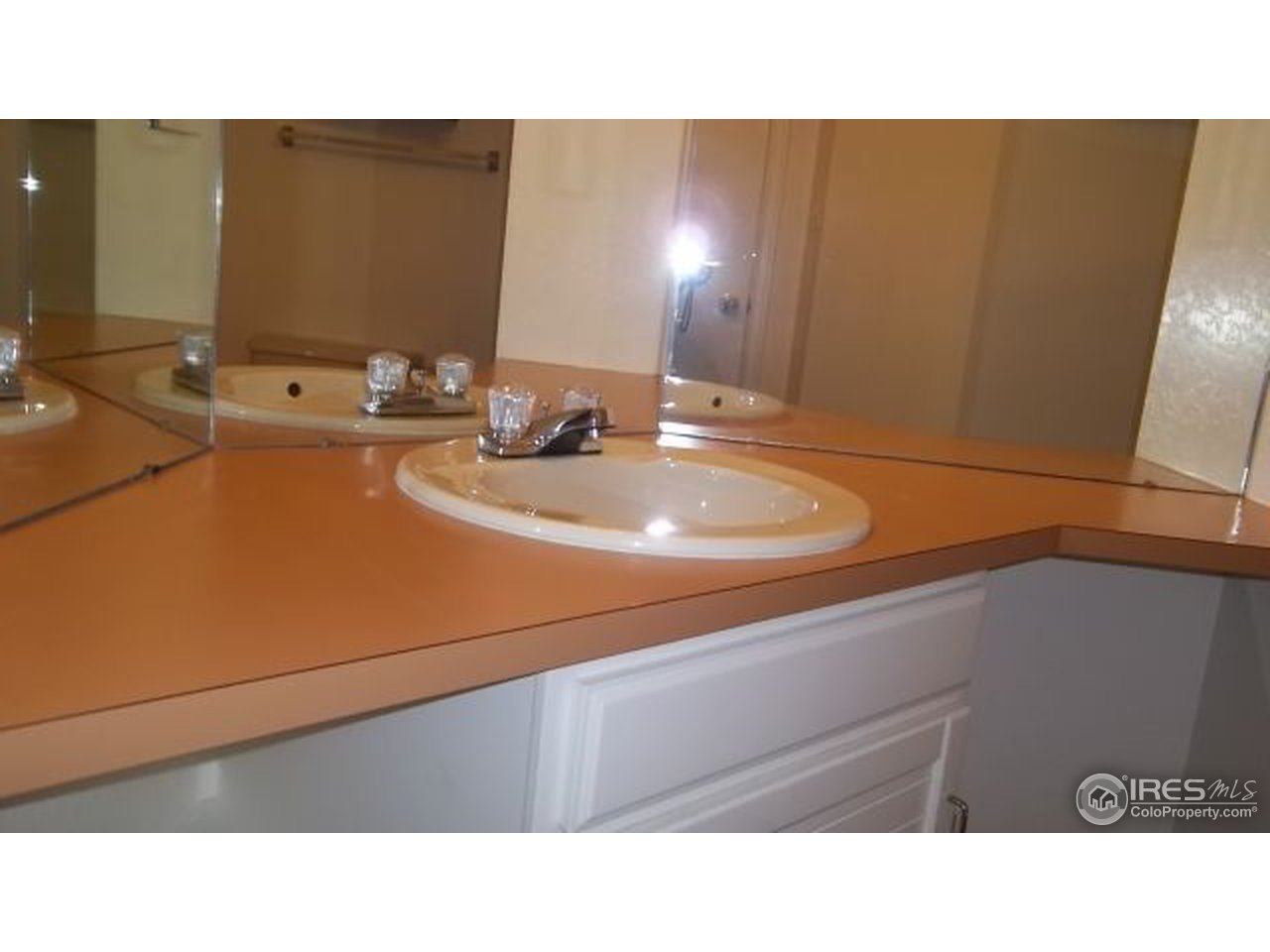 5046 Buckingham Road, Unit 6 Boulder, CO 80301 - Photo 18 of 23 Master bath vanity, triple mirror