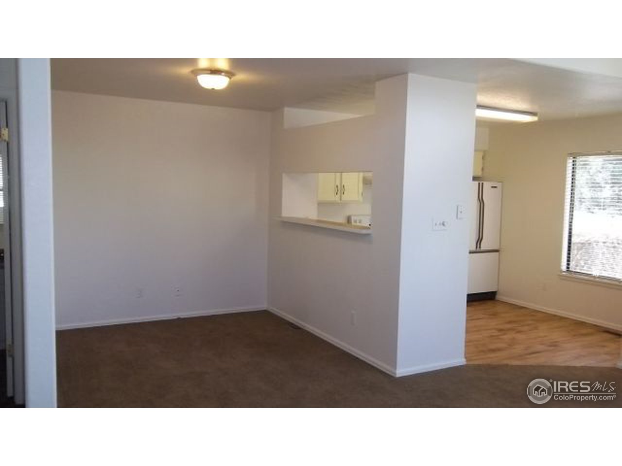 5046 Buckingham Road, Unit 6 Boulder, CO 80301 - Photo 7 of 23 Full sized dining with pass through from kitchen