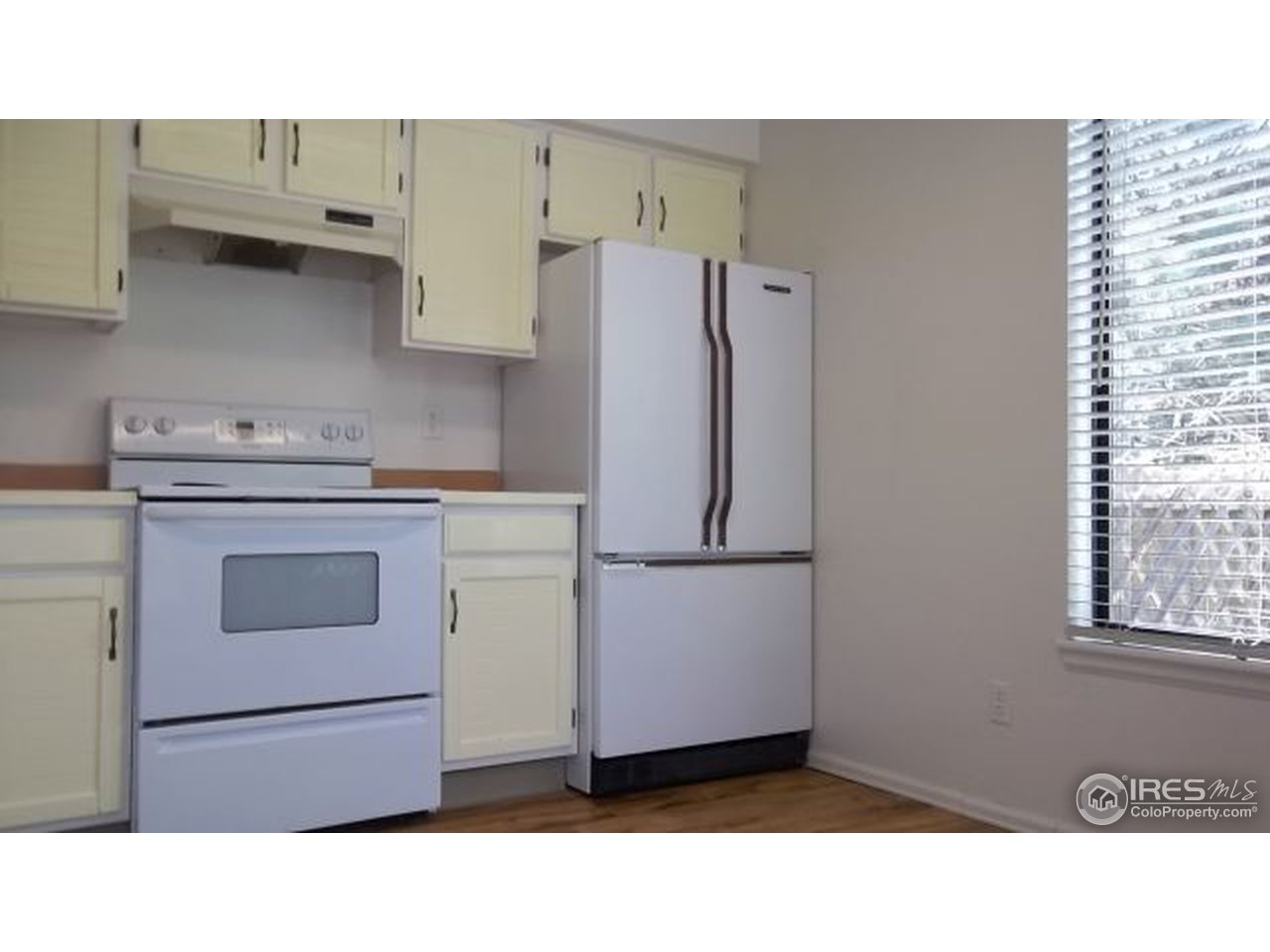 5046 Buckingham Road, Unit 6 Boulder, CO 80301 - Photo 10 of 23 More kitchen, showing windows