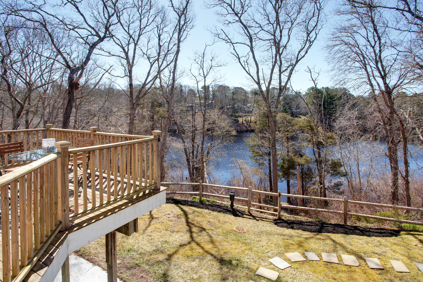 a view of a balcony with trees