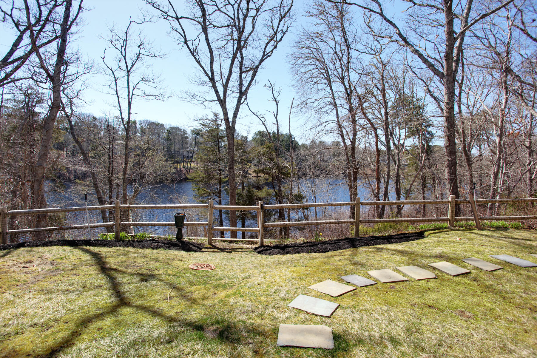 321 Tower Hill Road Osterville, MA 02655 - Photo 11 of 43 a view of a swimming pool with trees
