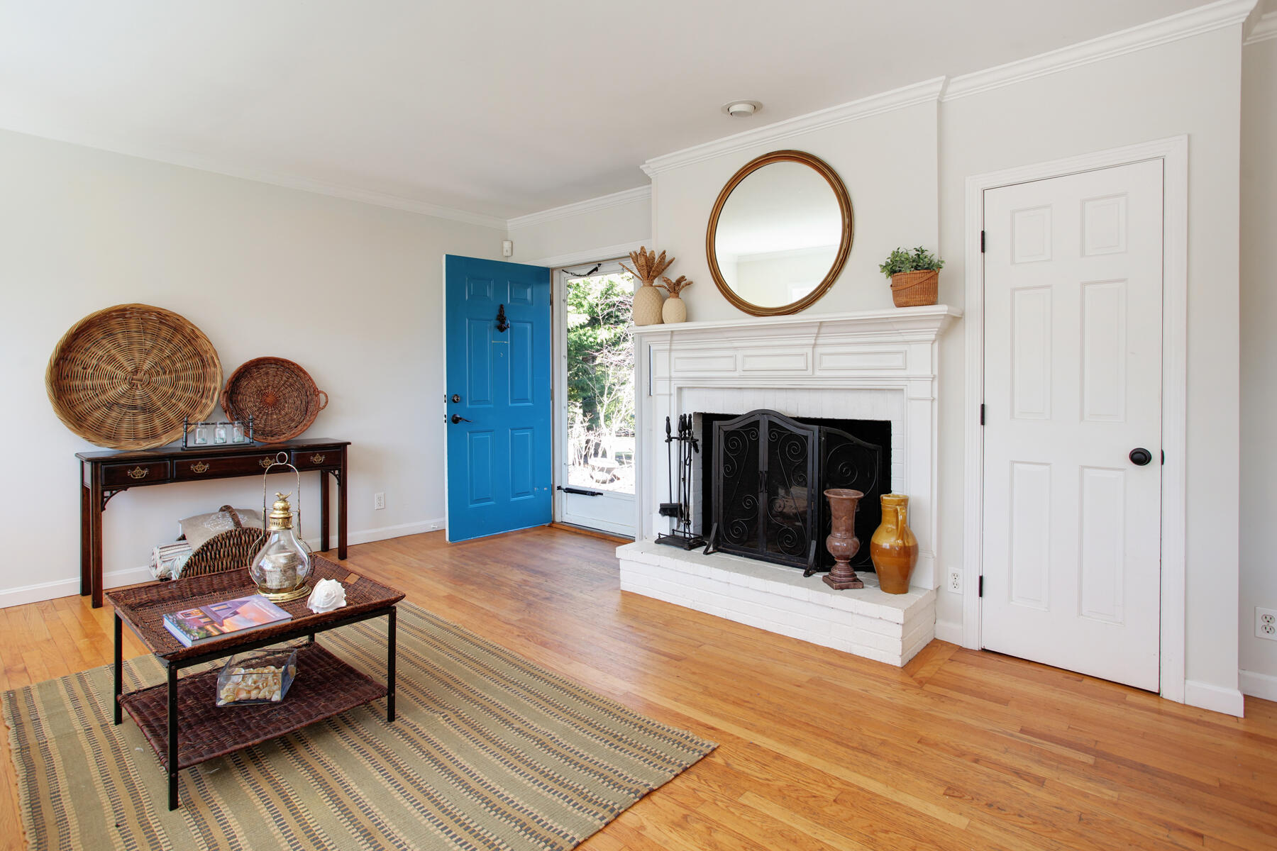 321 Tower Hill Road Osterville, MA 02655 - Photo 14 of 43 a living room with furniture and a fireplace