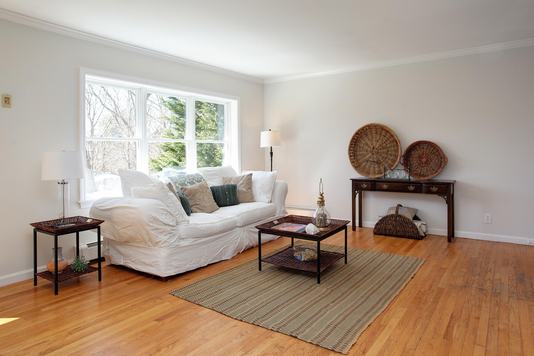 321 Tower Hill Road Osterville, MA 02655 - Photo 17 of 43 a living room with furniture and a window