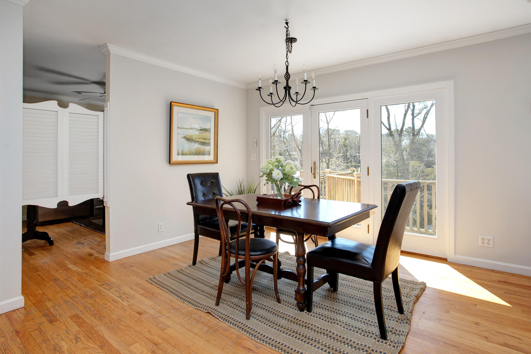 321 Tower Hill Road Osterville, MA 02655 - Photo 20 of 43 a view of a dining room with furniture window and wooden floor