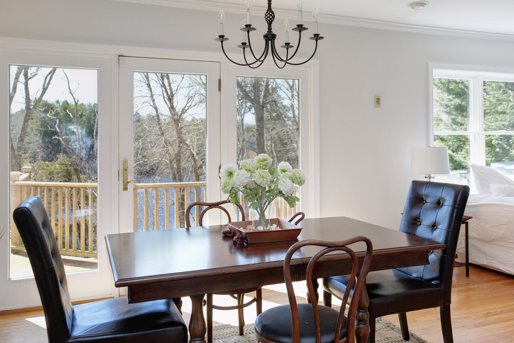 321 Tower Hill Road Osterville, MA 02655 - Photo 21 of 43 a view of a dining room with furniture window and outside view