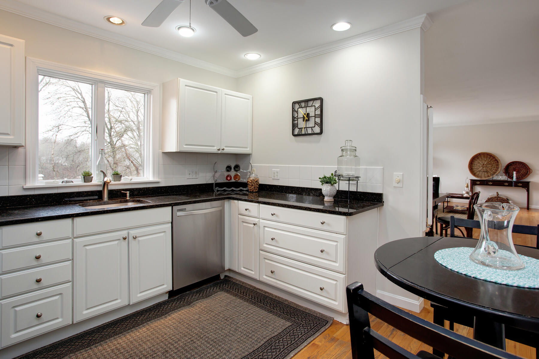 321 Tower Hill Road Osterville, MA 02655 - Photo 22 of 43 a kitchen with granite countertop white cabinets and a sink
