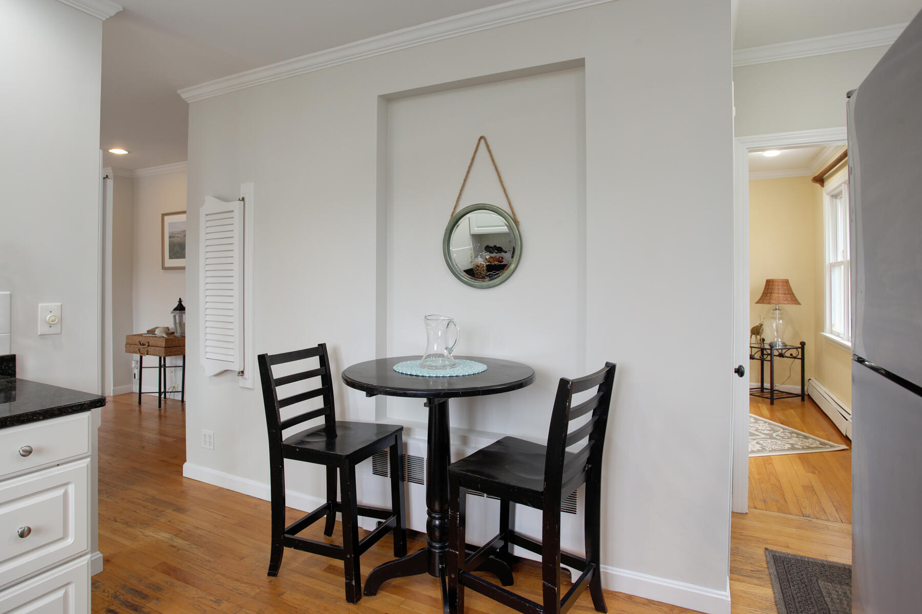 321 Tower Hill Road Osterville, MA 02655 - Photo 25 of 43 a view of a dining room with furniture and wooden floor