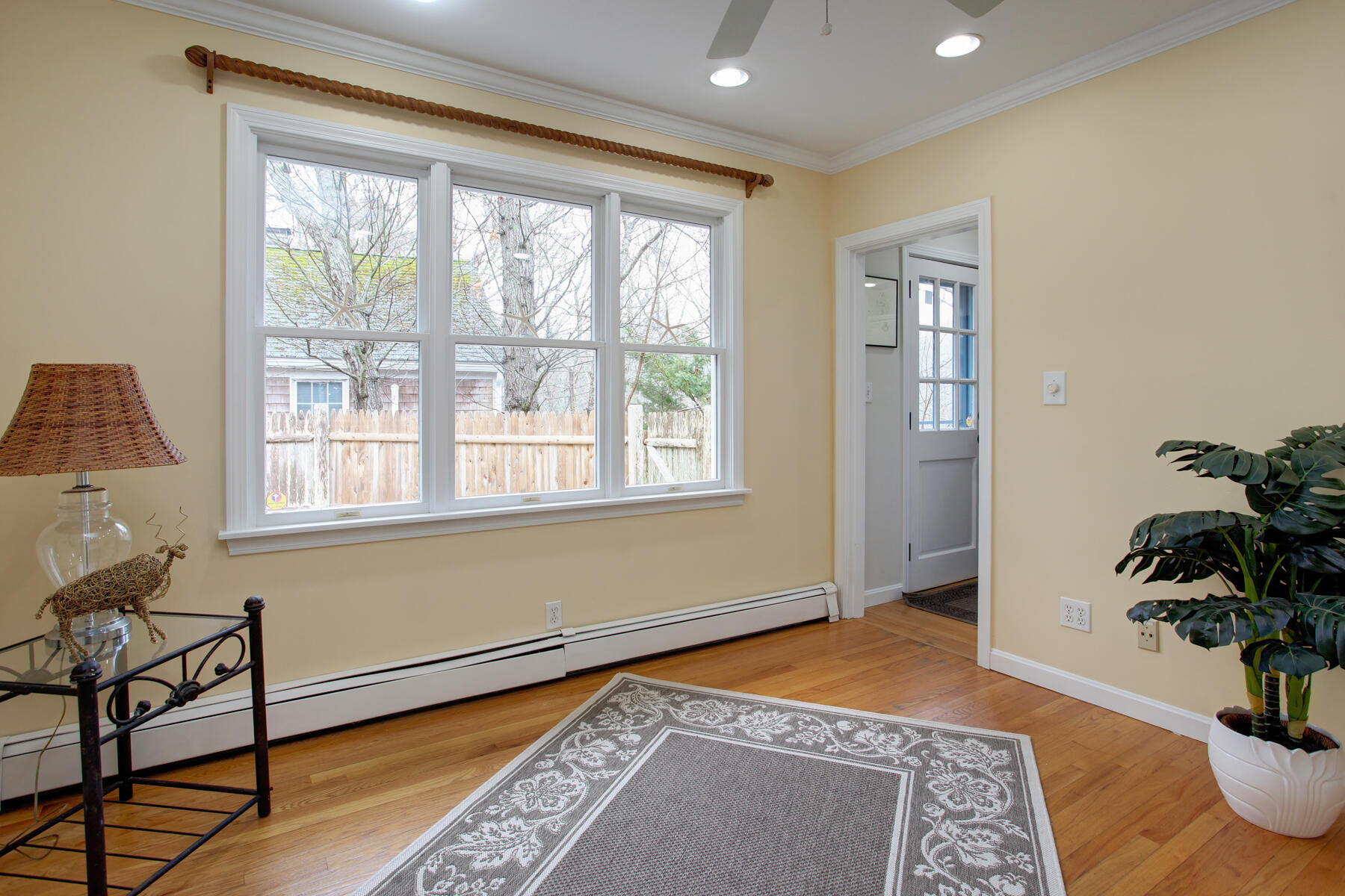 321 Tower Hill Road Osterville, MA 02655 - Photo 27 of 43 a bedroom with furniture and a potted plant