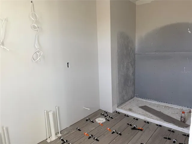 a view of small space with wooden floor