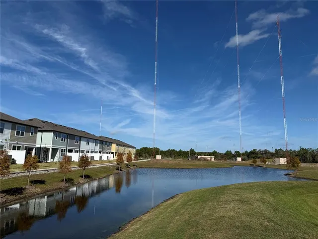 a view of a road with a building in the background