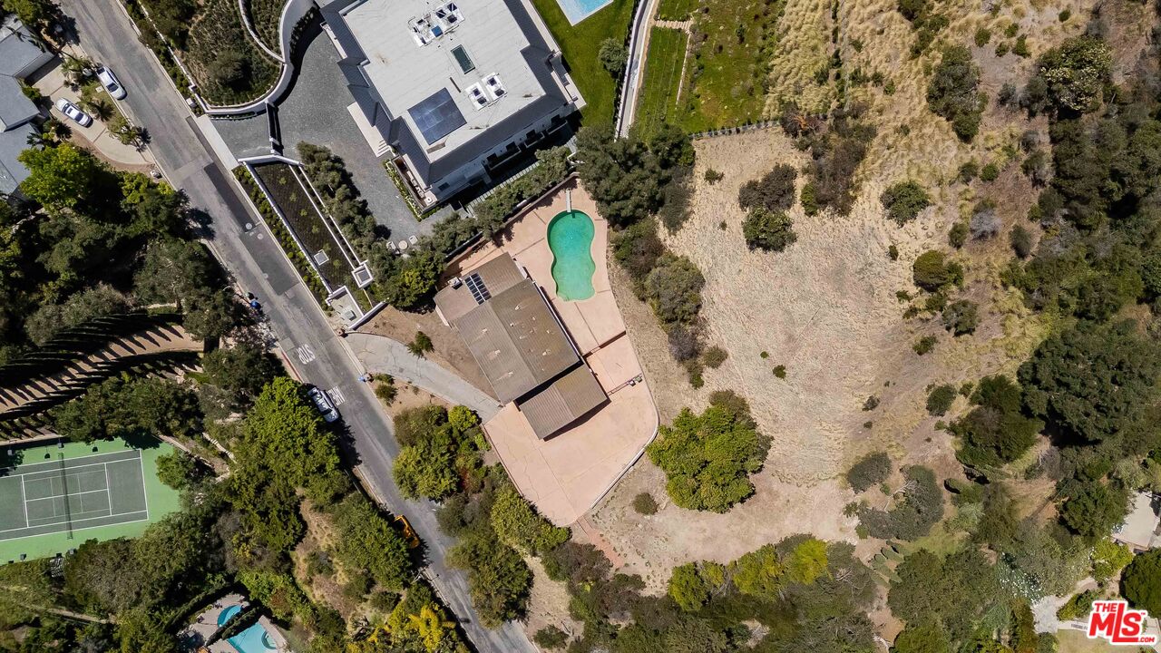 1181 Somera Road Los Angeles, CA 90077 - Photo 34 of 40 an aerial view of a house with a yard and garden